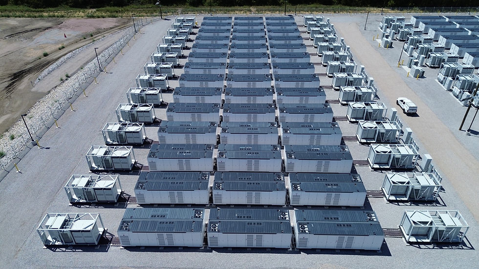Aerial photograph of the Anole battery energy storage site near Seagoville, Texas, showing rows of gray battery enclosures and cooling equipment.